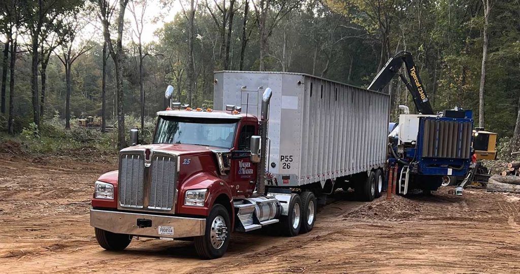 Family Logging Operation Features W990s in Fleet of Kenworths World's